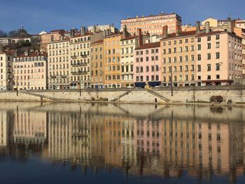 Reflection of buildings in lake