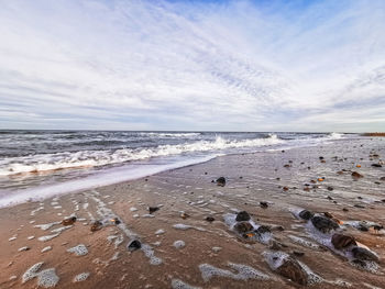 Scenic view of beach against sky