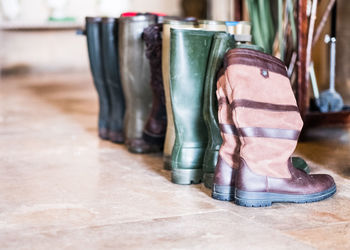 Boots on tiled floor