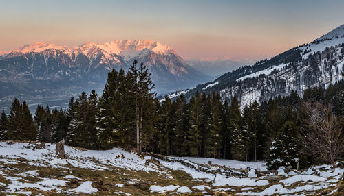 Scenic view of mountains against sky during winter