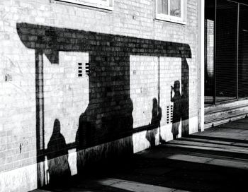 Shadow of woman on wall