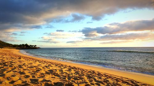 Scenic view of sea at sunset