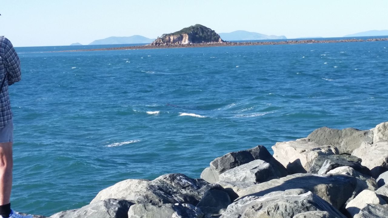 sea, nature, water, rock - object, beauty in nature, scenics, tranquil scene, day, mountain, tranquility, outdoors, clear sky, no people, sunlight, blue, horizon over water, sky