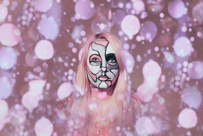 Close-up of woman with face paint