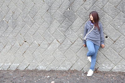 Full length of woman standing outdoors