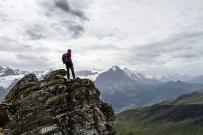 Full length of man on mountain against sky