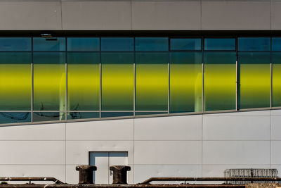 Reflection of building on glass window