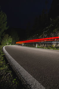 Light trails on road at night