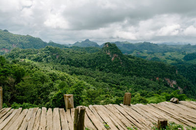 Countryside landscape against clouds