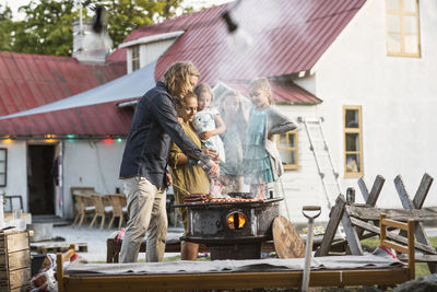 Family having barbecue