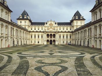 Facade of historic building against sky