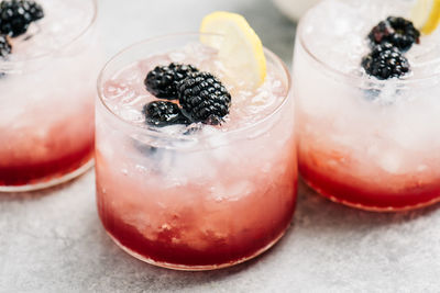 High angle view of bramble cocktails in a row