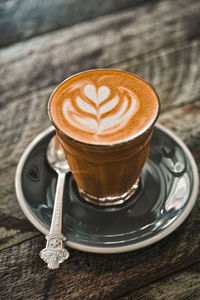 Close-up of cappuccino on table