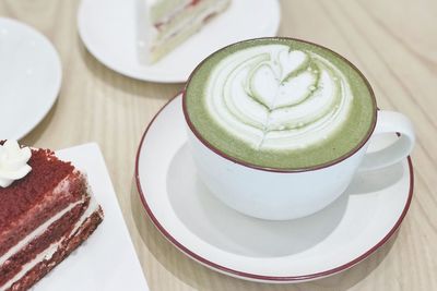 High angle view of coffee served on table