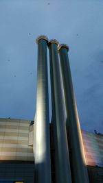 Low angle view of building against blue sky