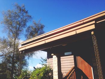 Low angle view of built structure against blue sky