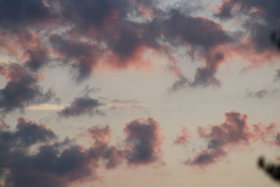 Low angle view of dramatic sky during sunset