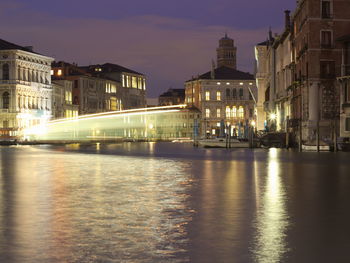 Illuminated buildings in city at night