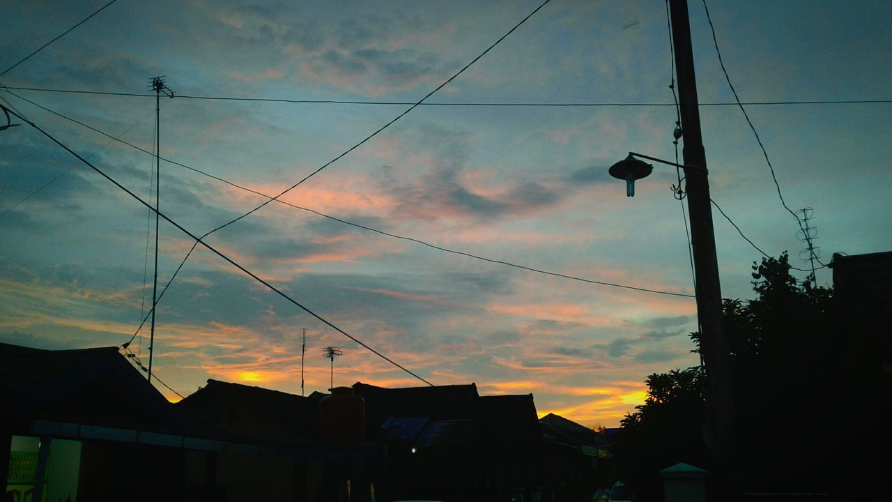 sky, cloud - sky, electricity, power supply, power line, cable, sunset, outdoors, low angle view, no people, connection, technology, nature, electricity pylon, architecture, day