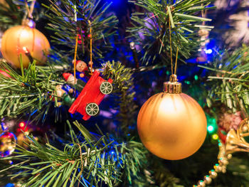 Close-up of illuminated christmas tree at night