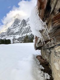 Snow covered mountain against sky