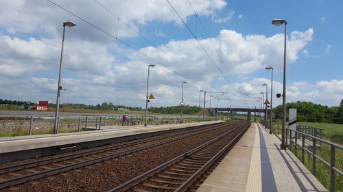 Railway tracks against sky