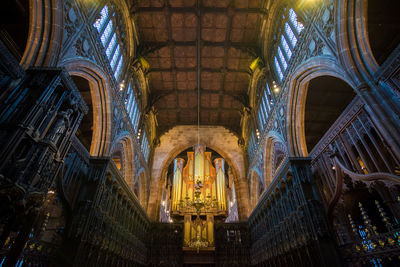 Low angle view of illuminated ceiling of building