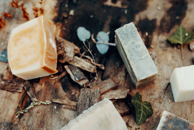 Making handmade natural soaps on an old wooden table