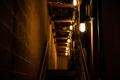 Low angle view of illuminated staircase in building