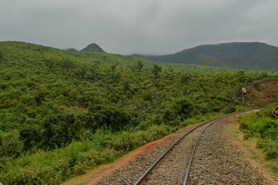 Railway line against a foggy background, kijabe hills hike, rift valley, kenya