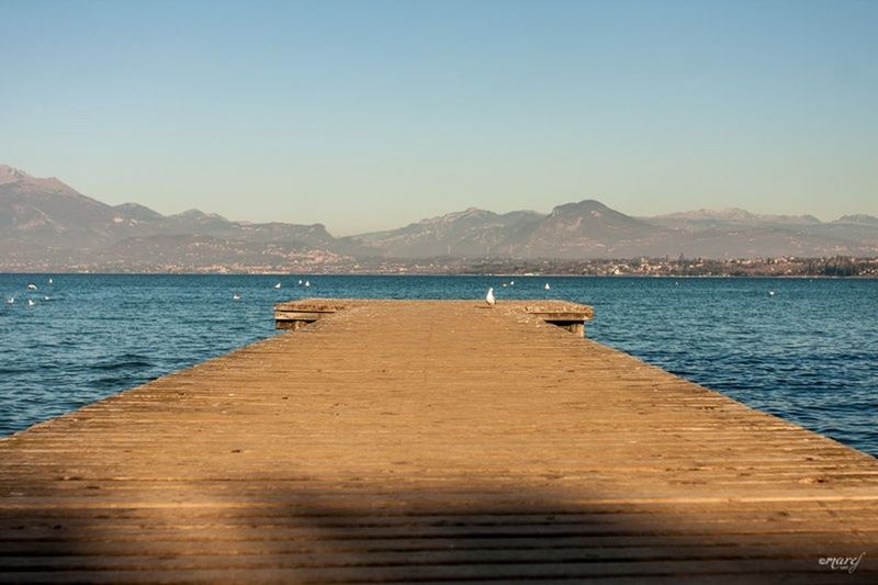 water, nautical vessel, outdoors, landscape, lake, mountain, travel destinations, scenics, beach, pedal boat, sky, no people, day, beauty in nature, wheelchair access