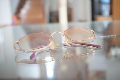 Close-up of sunglasses on table