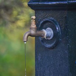 Close-up of water running from faucet