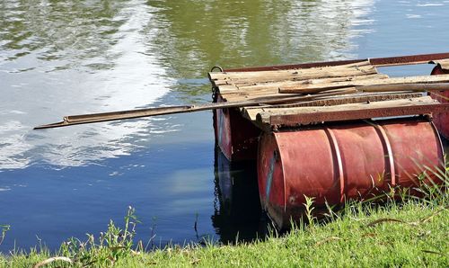 Boat moored in lake