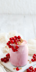 Close-up of red berries on table