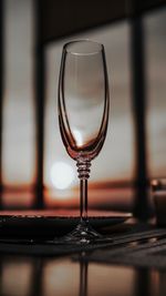 Close-up of wineglass on table