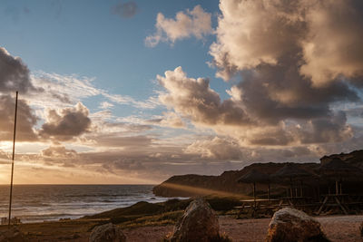 Panoramic view of sea against sky during sunset