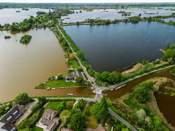 High angle view of city by lake