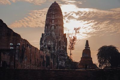 Low angle view of building against sky during sunset