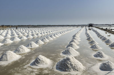 A pile of sea salt in the salt field at petchaburi, thailand