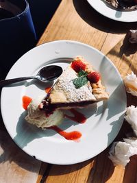 High angle view of cake in plate on table