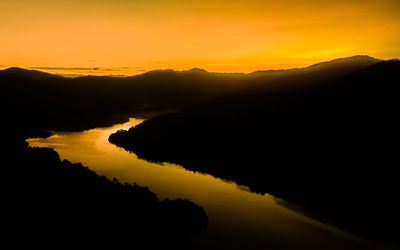 Scenic view of mountains at sunset