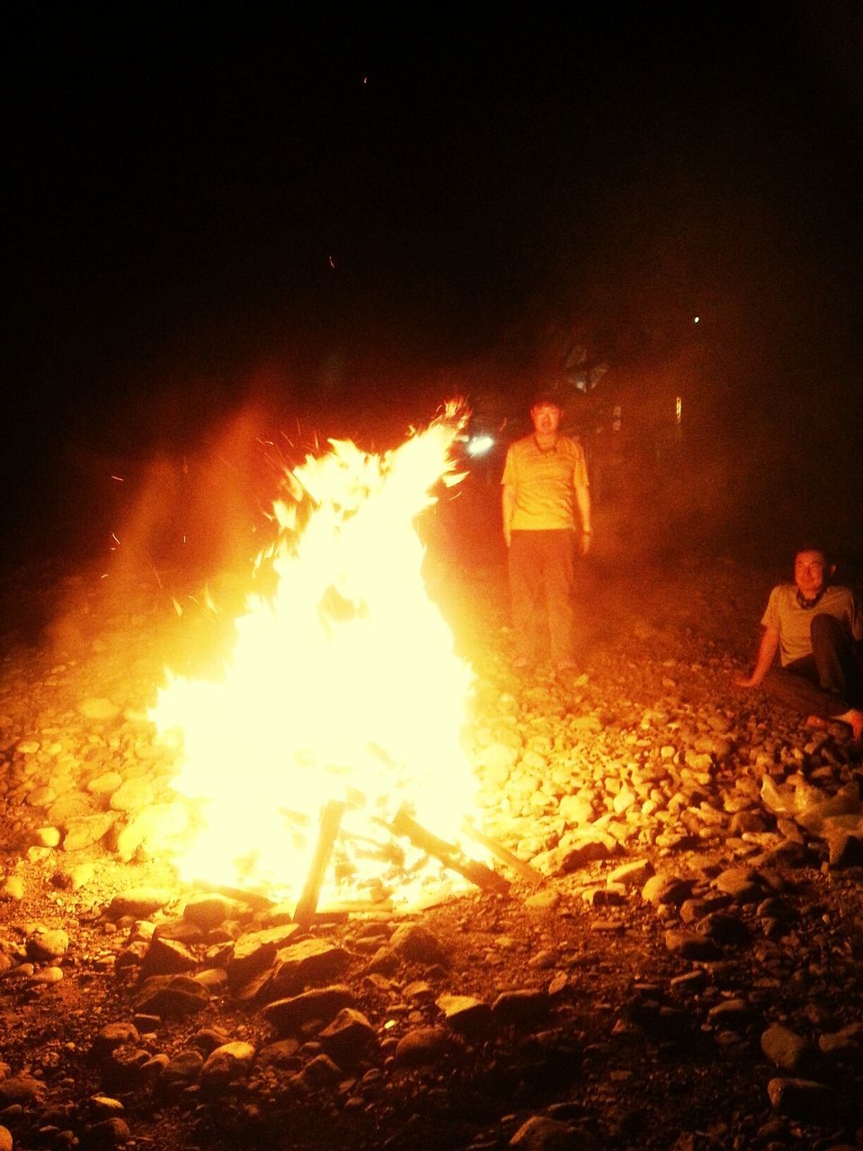 burning, fire - natural phenomenon, flame, heat - temperature, bonfire, fire, glowing, lifestyles, leisure activity, orange color, night, campfire, men, motion, outdoors, firewood, heat, sunlight