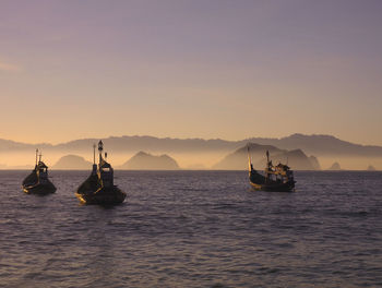 Scenic view of sea at sunset