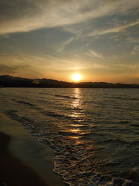 Scenic view of sea against sky during sunset