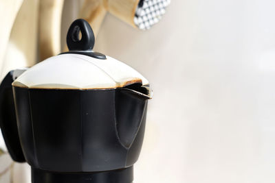 Close-up of coffee cup on table