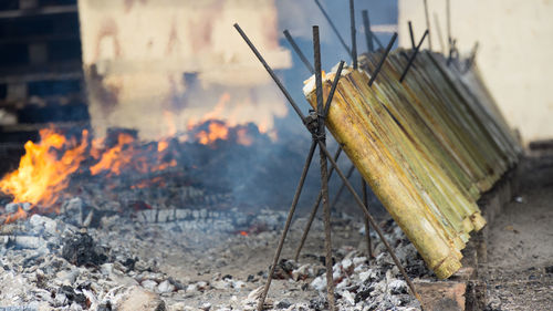 Close-up of fire burning on wood