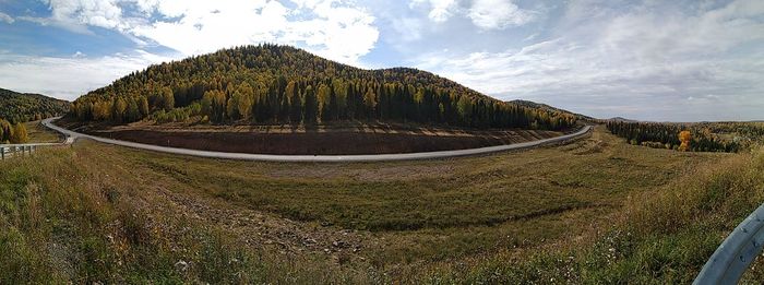 Panoramic view of road on mountain against sky