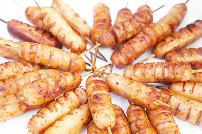 High angle view of meat on barbecue grill