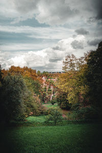 Trees on landscape against sky during autumn